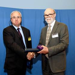 Professor Nicholas Kusznir receiving the Lyell Medal at the Geological Society's 2019 President's Day.